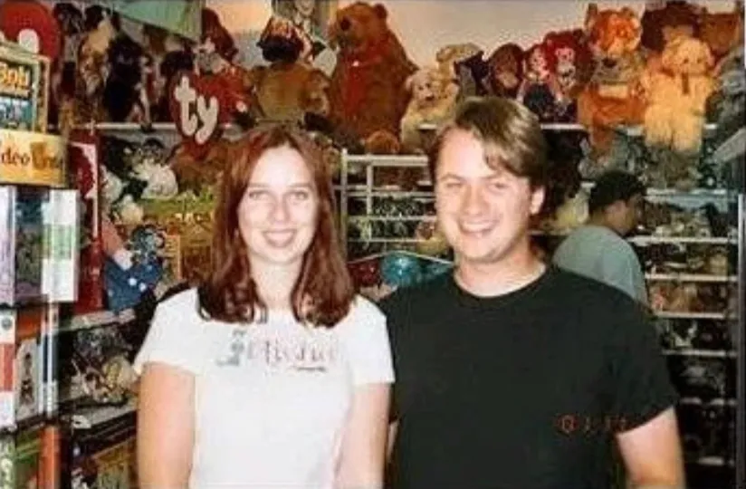 Neopets co-creators Donna Williams and Adam Powell standing together in a toy shop during the site's early years.